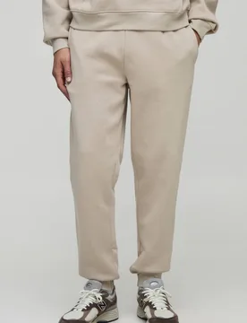 Herren Basic Regular Fit Jogginghose Stone Größe Small - boohooMAN - FashionsVida