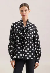Schluppenbluse in strukturierter Ware mit Tupfenprint Schwarz 40