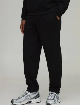 Herren Basic Regular Fit Jogginghose Black Größe XS - boohooMAN - FashionsVida