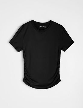 Blusa tinta unita a maniche corte - nero