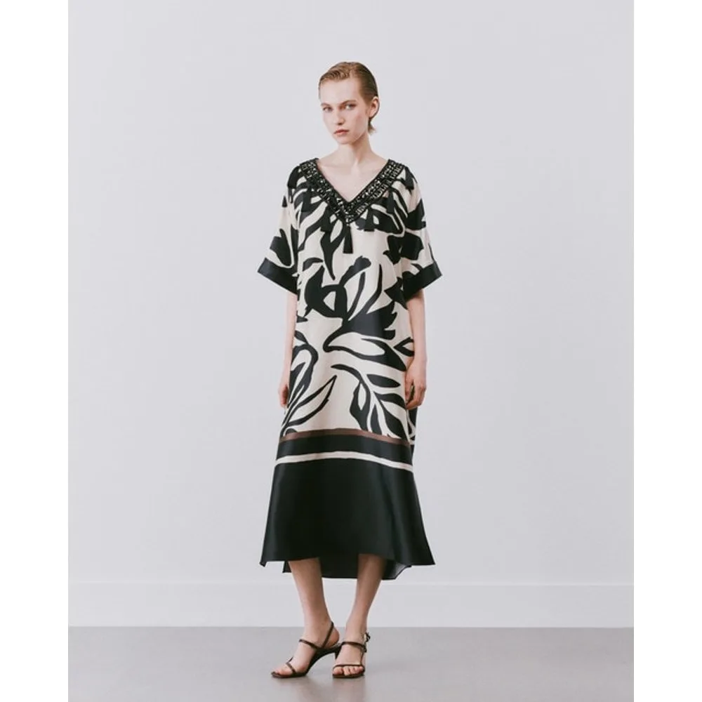 Vestido midi estilo túnica con borlas en escote - Woman Fiesta El Corte Inglés - FashionsVida
