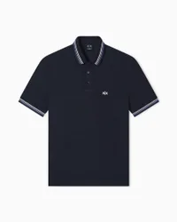 Polo Exchange blu in cotone con bordino a righe e logo ricamato