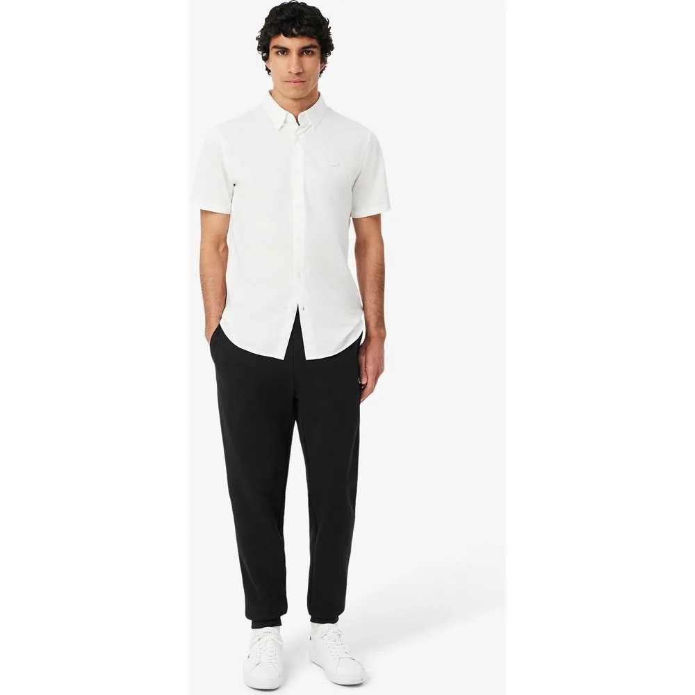 Pantalón de hombre de chándal con ribete de logotipo - Lacoste - FashionsVida