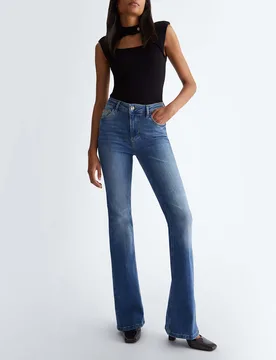 Jeans a zampa blu stone washed in cotone stretch a vita alta - Liujo - FashionsVida