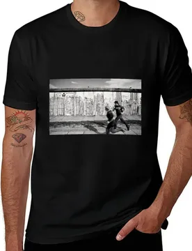 Two kids running along the remains of the Berlin Wall, Berlin, Germany T-Shirt designer shirts graphic shirts Men's t-shirt - Aliexpress - FashionsVida