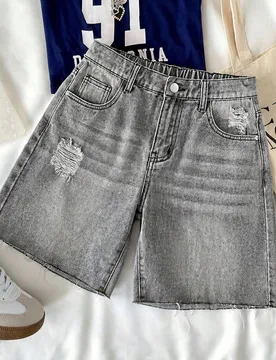 Shorts vaqueros grises lavados de tiro bajo rasgados con dobladillo deshilachado, estilo casual Y2K de los 2000 para adolescentes, para verano y prima - Shein - FashionsVida