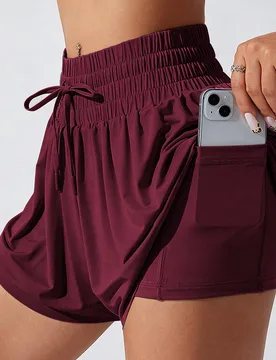 Shorts deportivos de mujer de color liso con lazo en la cintura, bolsillos y doble capa - Shein - FashionsVida