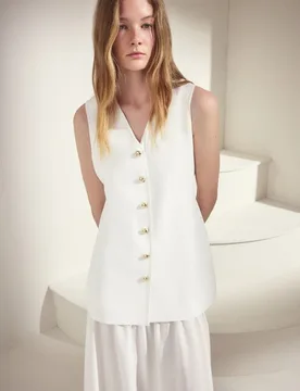 Vestido sin mangas combinado con chaleco tricot - Woman El Corte Inglés - FashionsVida