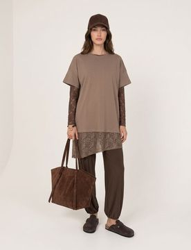 Abito mini con fondo asimmetrico in pizzo - beige