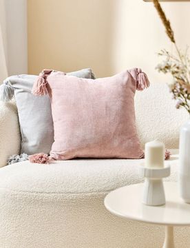Fodera per cuscino con nappine - rosa pastello