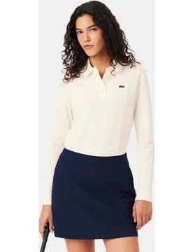Polo de mujer de golf termorregulador con protección UV en azul de manga corta - Lacoste - FashionsVida