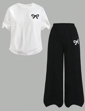 Set de 2 piezas de blusa de manga raglán con cuello redondo y pantalones cortos plisados con estampado gráfico, de punto suelto y casual para adoles - Shein - FashionsVida