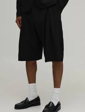 Herren Kurze Hose Im Leinen-Look Mit Weiter Passform Und Bundfalten In Schneider-Optik Black Größe 38 - boohooMAN - FashionsVida