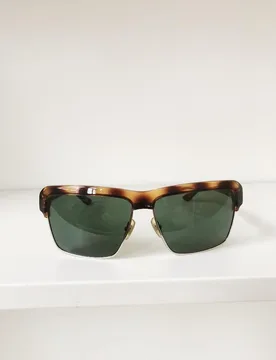 Miu Miu Tortoise Shell Sunglasses - Miu Miu - FashionsVida