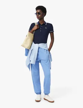 Polo slim-fit blu con bordino azzurro e bianco in cotone elasticizzato - Lacoste - FashionsVida