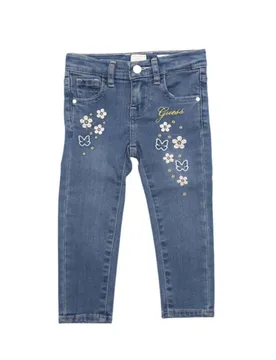 Jeans skinny lavaggio medio in misto cotone con ricami floreali e logo - Guess - FashionsVida