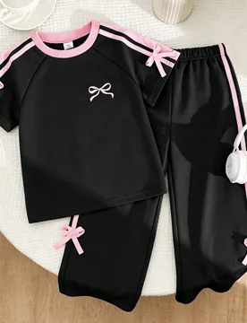 Conjunto de camiseta casual nuevo para niñas jóvenes primavera/verano, camiseta de cuello redondo con manga raglán y decoración de lazo 3D de cint - Shein - FashionsVida