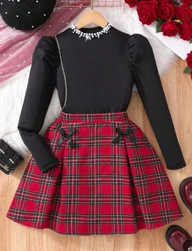 Conjunto de 2 piezas de moda para niñas preadolescentes, de tela texturizada negra con diseño de tachuelas. Falda a cuadros con decoración de lazo - Shein - FashionsVida