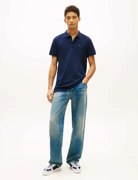 Polo blu in piqué di cotone con logo bandierina ricamato sul petto - Tommy Jeans - FashionsVida