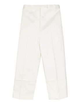 Pantaloni affusolati con piega stirata