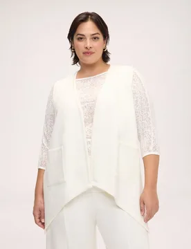 Chaleco de mujer en tejido elástico bajo asimétrico dobladillo asimétrico en pico y dos bolsillos de parche frontales - Fiorella Rubino - FashionsVida