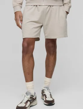 Herren Leichte Basic Entspannt Geschnittene Mittellange Shorts Stone Größe Medium - boohooMAN - FashionsVida