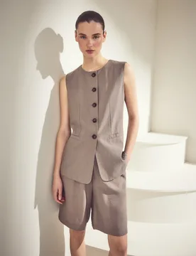 Chaleco de mujer largo liso - Woman El Corte Inglés - FashionsVida