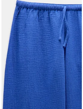Pantalones anchos de mujer 100% algodón con cierre de cordón en liso - Parfois - FashionsVida