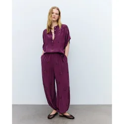 Pantalón ancho de mujer con detalles