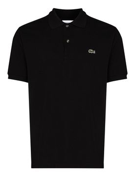 Polo nera in cotone con patch logo