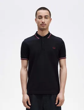 Polo mezza manica blu con bordino rosa e bordeaux - Fred perry - FashionsVida