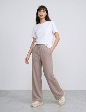 Pantaloni a gamba larga in maglia a costine spessa con fodera in pile - grano
