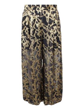 Pantaloni harem con motivo marmorizzato oro