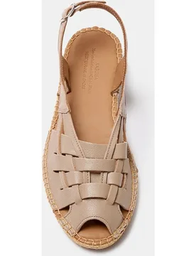 Alpargata plana de mujer tipo sandalia cangrejera con tiras de piel trenzadas y suela de yute con cierre de hebilla - Naguisa - FashionsVida