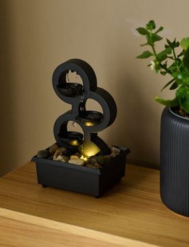 Fontana decorativa da tavolo con ciottoli e triplo flusso d'acqua - nero