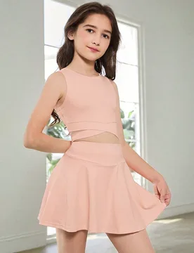 Conjunto de top sin mangas de unicolor y falda de tenis para niñas preadolescentes, diseño de cintura alta elegante y ajuste ceñido que alarga, có - Shein - FashionsVida
