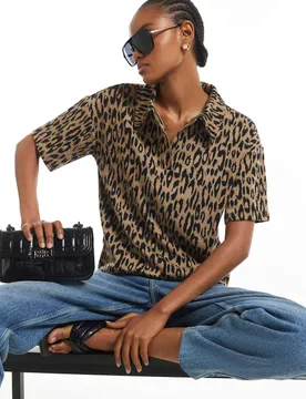 Pure Cotton Leopard Jacquard Polo Top Black Mix female - River Island - FashionsVida