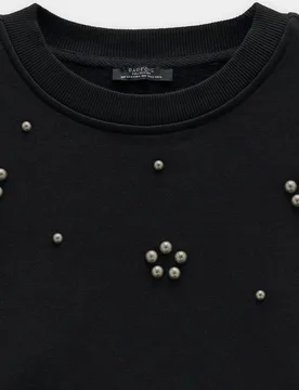 Sudadera de mujer sin capucha con aplicaciones de esfera - Parfois - FashionsVida