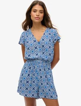 Superdry Damen Kurzärmeliger Playsuit mit Print Blue - Größe: 44 - 64.99 - FashionsVida