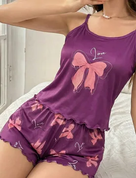 Conjunto de pijama informal de niña con estampado de mariposas, camiseta de tirantes con volantes y pantalones cortos en color rosa - Shein - FashionsVida