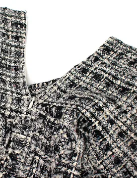 Black and White Tweed Mini Skirt with Fringe Hem - Chanel - FashionsVida