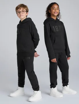 Manchester United Kids 1878 Joggers Black 13-14Y - Raw - FashionsVida