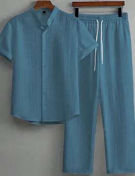 Conjunto de 2 piezas para hombre, camisa de manga corta de unicolor con textura y pantalón holgado de pierna recta con cintura de cordón, azul empol - Shein - FashionsVida