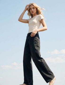 Jeans wide leg con effetto lavato - nero