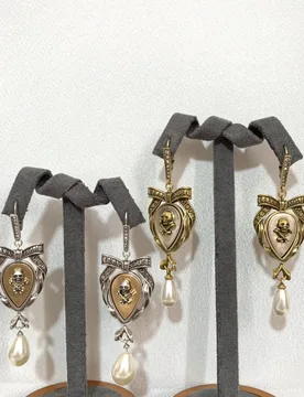 New Bow Skull Pearl Earrings For Women With A High-end Feel Dark Personality Water Droplet Shaped Color Blocked Ear Buckle - Aliexpress - FashionsVida
