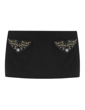 Minigonna con tasche decorate