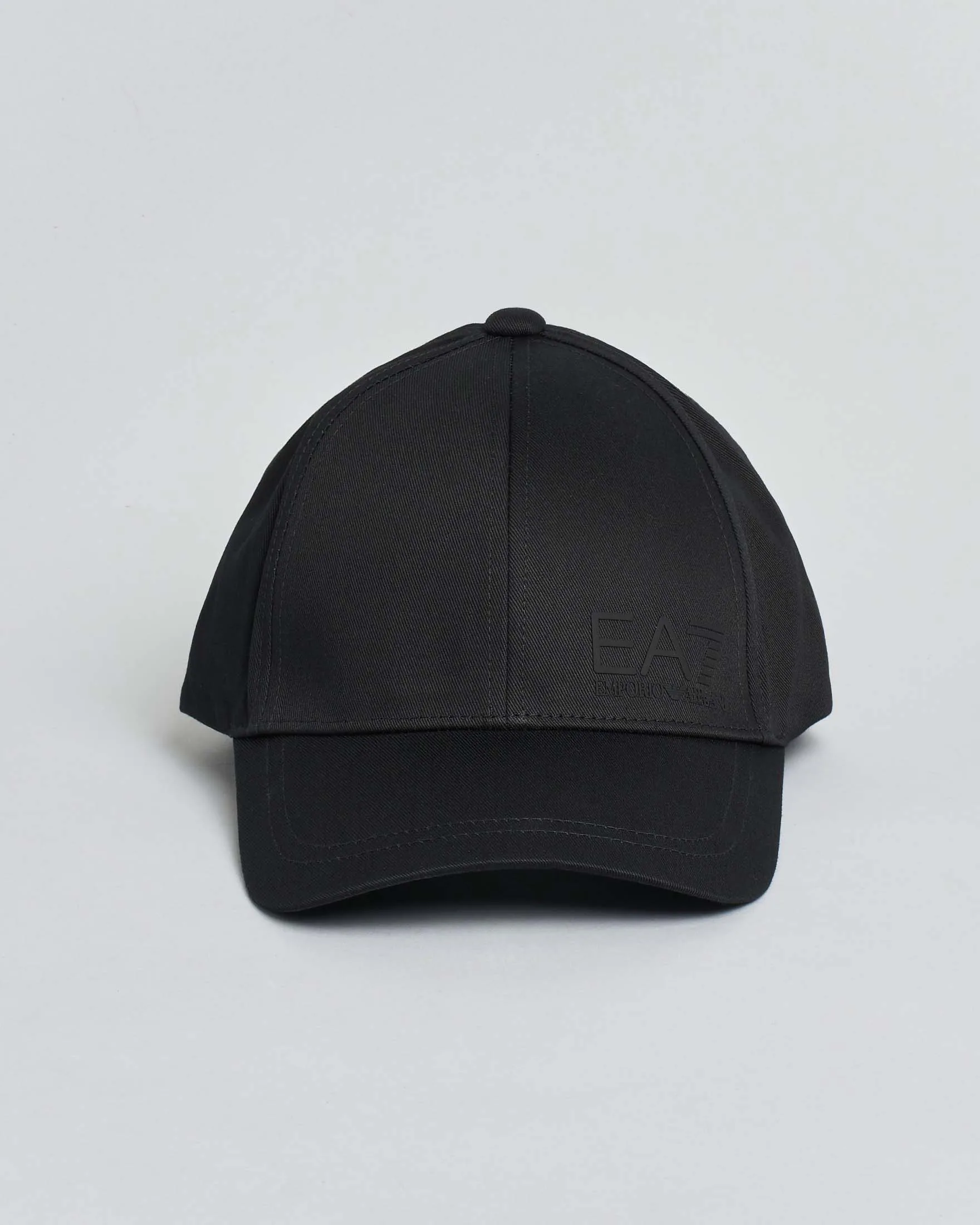 Berretto nero in cotone con frontino e logo monogramma in tono - EA7 - FashionsVida