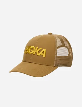 Core Logo Trucker in Mustard Seed - HOKA - FashionsVida
