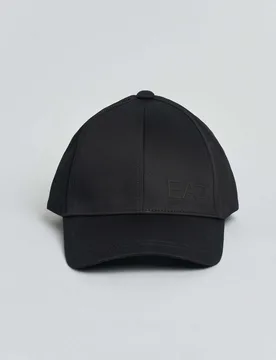 Berretto nero in cotone con frontino e logo monogramma in tono - EA7 - FashionsVida