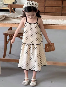 Set de 2 piezas de blusa sin mangas y falda con lunares para niña, ideal para vacaciones de verano - Shein - FashionsVida